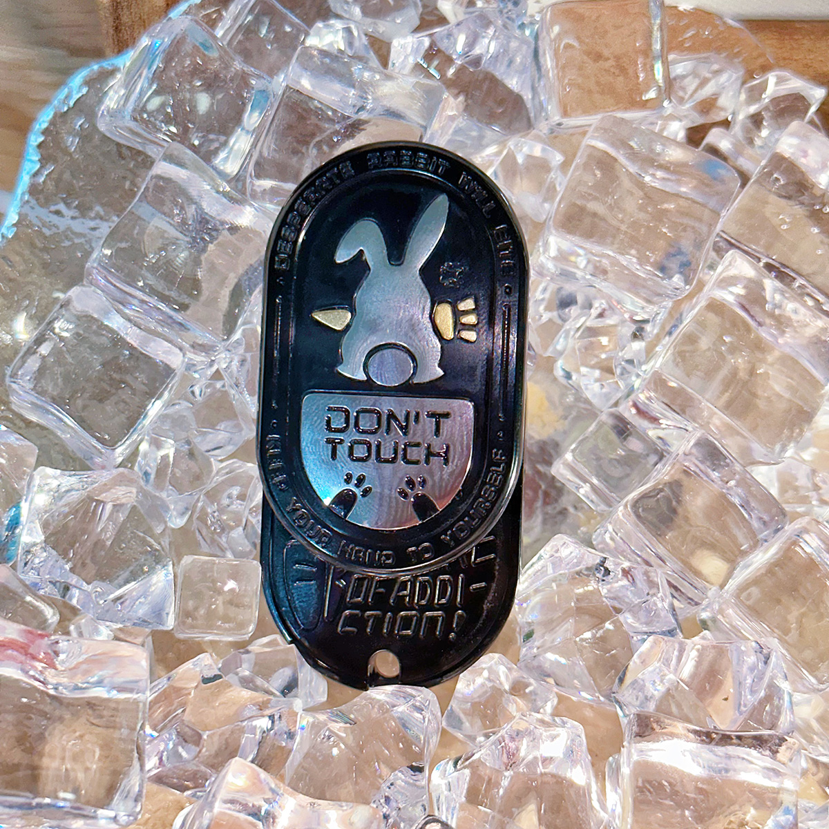 The "Irritable Bunny Ding-Ding Push Card Stress Relief Toy" made of stainless steel, a trendy plaything.