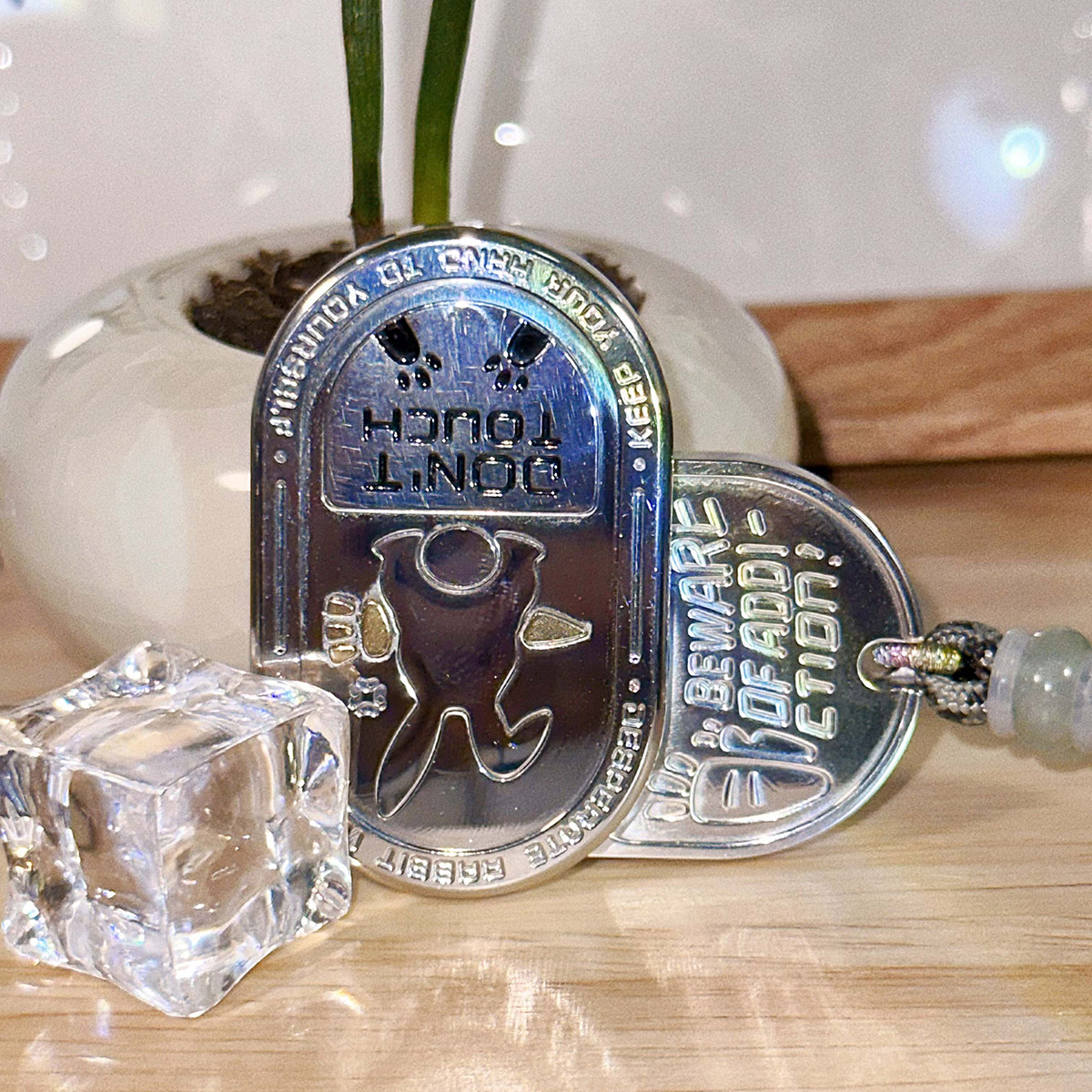 The "Irritable Bunny Ding-Ding Push Card Stress Relief Toy" made of stainless steel, a trendy plaything.